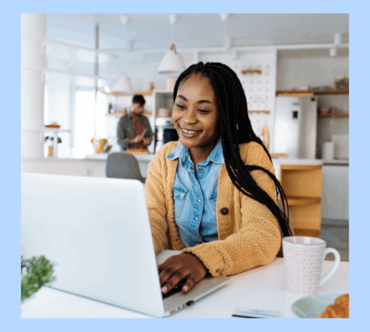 a woman training to be a freight broker on a laptop