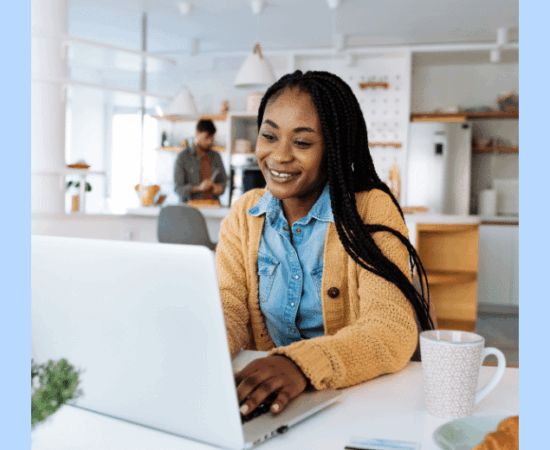 a woman training to be a freight broker on a laptop