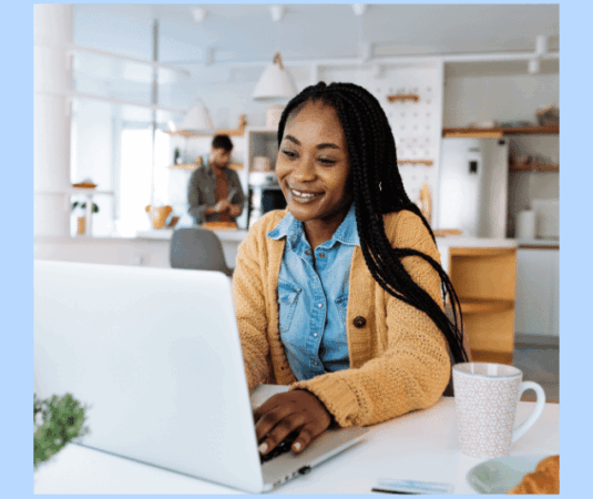 a woman training to be a freight broker on a laptop